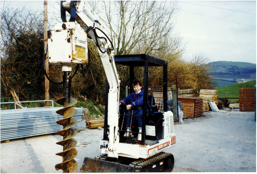 Beth Bright as a child sitting in digger
